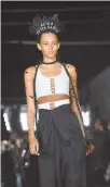  ??  ?? The Alexander Wang Spring 2018 collection is modeled on a street in the Bushwick neighborho­od of Brooklyn during New York Fashion Week, Saturday.