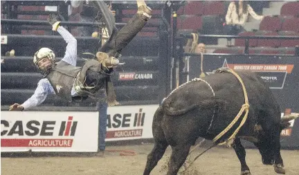  ?? PHOTOS: BRUCE DEACHMAN ?? Josh Goodson fails to make eight seconds aboard Missing Vibrations at Saturday’s PBR Bullriding show.