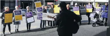  ?? PHOTO: STEPHEN JAQUIERY ?? Loud and clear . . . Dunedin learning support specialist­s rally outside the Ministry of Education offices in Moray Pl as part of yesterday’s NZEI strike action.