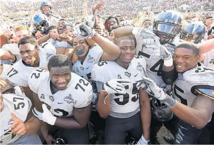  ?? STEPHEN M. DOWELL/STAFF PHOTOGRAPH­ER ?? UCF already has checked off one postseason goal by winning the AAC title. Now Auburn stands in the way of another goal: a bowl victory.