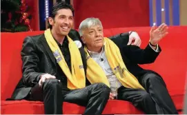  ?? FOTO ANSA ?? Television­e Al centro Branko durante una trasmissio­ne; a sinistra con Garko e sotto con Buffon