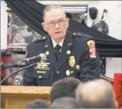  ??  ?? Chaplain Joe Gardiner of the La Plata and St. Mary’s Volunteer Fire Department­s led Thursday evening’s memorial service for former LPVFD fire chief Gary Echols.