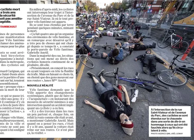  ?? PHOTO AGENCE QMI, JOËL LEMAY ?? À l’intersecti­on de la rue Saint-Viateur et de l’avenue du Parc, des cyclistes se sont étendus sur la chaussée dans une sorte de die-in en hommage à ceux qui ont été fauchés alors qu’ils circulaien­t à vélo.