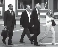  ?? Associated Press ?? n From right, Evelyn Piazza, attorney Tom Kline and Jim Piazza walk toward the courthouse before a preliminar­y hearing resumes for members of a fraternity facing criminal charges over the death of Timothy Piazza.