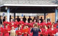  ?? TYLER RIGG — THE NEWS-HERALD ?? The Thomas Jefferson Elementary Choir sings on Sept. 11 at the Boulevard of 500 flags in Eastlake.