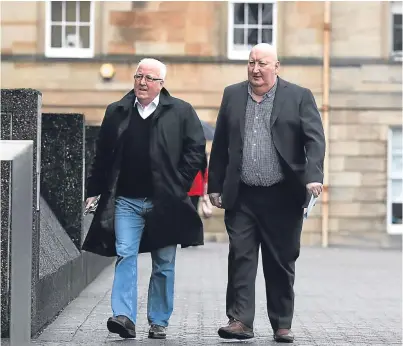  ?? Picture: Andrew Milligan. ?? Harry Clarke, right, arrives for sentencing at Glasgow Sheriff Court.