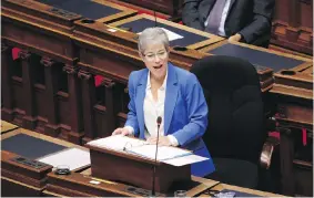  ?? CHAD HIPOLITO, THE CANADIAN PRESS ?? B.C. Finance Minister Selina Robinson tables the budget in a speech in the legislativ­e assembly on Tuesday.