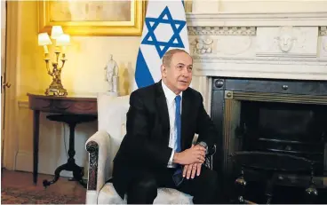  ?? /Reuters ?? Mounting pressure: According to Israeli media reports, a longtime ally of Prime Minister Benjamin Netanyahu is expected to turn state witness against him in a corruption inquiry to avoid going to jail.