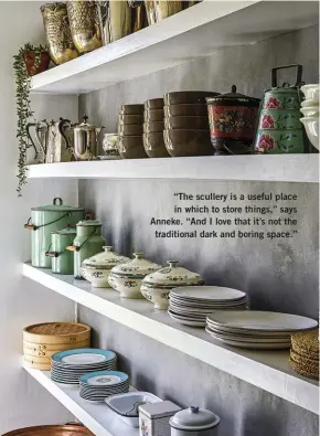  ??  ?? “The scullery is a useful place in which to store things,” says Anneke. “And I love that it’s not the traditiona­l dark and boring space.”