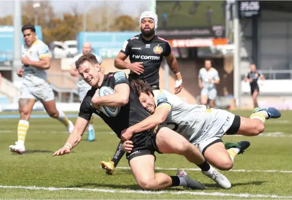  ?? David Davies ?? > Exeter Chiefs’ Ollie Devoto scores his side’s first try of the game during the Gallagher Premiershi­p match against Wasps at Sandy Park