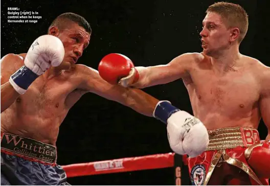  ?? Photo: TOM HOGAN/HOGAN PHOTOS/GOLDEN BOY ?? BRAWL: Quigley [right] is in control when he keeps Hernandez at range