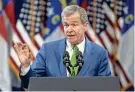  ?? ?? Governor Roy Cooper spoke prior to President Joe Biden at the Wilmington Convention Center on Thursday.