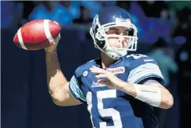  ?? Fred Thornhill/THE CANADIAN PRESS ?? Toronto Argonauts’ quarterbac­k Ricky Ray passed for over 400 yards against the Roughrider­s, who need similar precision against the Lions.