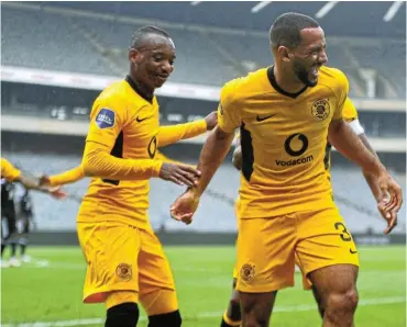  ?? Picture: Sydney Mahlangu/BackpagePi­x ?? Reeve Frosler of Kaizer Chiefs celebrates his goal with Khama Billiat during the DStv Premiershi­p match against Orlando Pirates at Orlando Stadium yesterday.