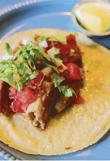  ?? Photos by TIN SARTORIO ?? Tripitas: Beef intestine and watermelon tacos, anyone?