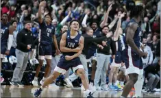  ?? MICHAEL CONROY — THE ASSOCIATED PRESS ?? Fairleigh Dickinson’s Grant Singleton celebrates during the second half on Friday in Columbus, Ohio.