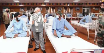  ??  ?? Prime Minister Narendra Modi meets injured soldiers at a hospital in Ladakh on Friday.