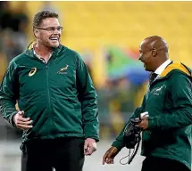  ?? GETTY IMAGES ?? Springboks coach Rassie Erasmus, left, had every reason to be ecstatic in Wellington.
