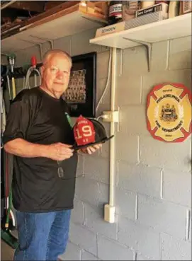  ?? GINGER RAE DUNBAR – DIGITAL FIRST MEDIA ?? Retired Deputy Chief Robert Marchisell­o kept a journal during his 37-year career as a Philadelph­ia firefighte­r. He began his career with Ladder 19.