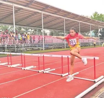  ?? ROLLY TORREFIEL, SUNSTAR INTERN ?? GOLDEN DEBUT.
Raichell Mae Pagunsan of Unit 4 secures the elementary girls’ 400m hurdles gold medal, having timed 1:23:00 on Day 1 of the Davao City Athletic Associatio­n (Dcaa) Meet 2024 athletics competitio­n at the University of Mindanao (UM) track oval on Thursday, February 29.