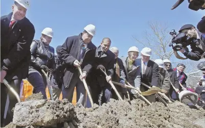  ?? AP FILE PHOTOS ?? URGENT PETITION: Mashpee Wampanoag Tribal Chairman Cedric Cromwell, above and below, wields a shovel with other officials during a groundbrea­king ceremony in 2016 for a casino. The tribe’s casino plan is in doubt due to a Trump administra­tion decision not to protect the reservatio­n.