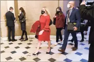  ?? Katherine Frey / The Washington Post ?? QAnon supporter Marjorie Taylor Greene, R- Ga., sports a “Trump Won” mask at the U. S. Capitol on the first day of the new congressio­nal session, Jan. 3, in Washington.