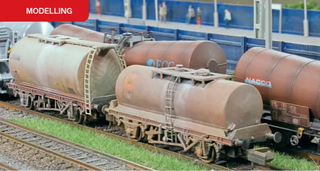  ?? ?? Two former caustic soda liquor tank wagons are pressed into china clay slurry traffic. Both are different wagons not commercial­ly available, thus adding variety to the collection.