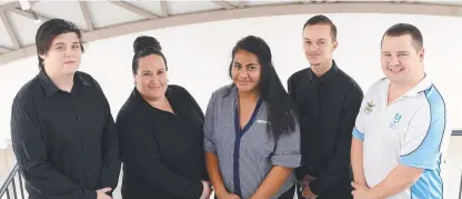  ?? HELPING HANDS: Rhyce Tuckey, Kelly Clinch, Marian Malua from the Cowboys, Jarva Sammons and Arthur Burchett from Allara Learning at this week’s North Queensland Cowboys Dream, Believe, Achieve graduation. Picture: WESLEY MONTS ??