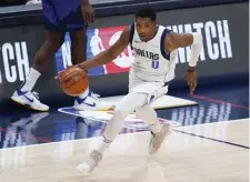  ?? AP FIle ?? LEFT BEHIND: Dallas’ Josh Richardson was among three Mavericks left behind in Denver on Friday after one player tested positive for COVID-19. The Mavericks game on Monday against New Orleans was postponed.