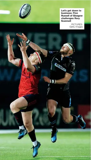  ?? PICTURES: Getty Images ?? Let’s get down to business: Finn Russell of Glasgow challenges Rory Scannell