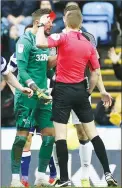  ??  ?? OFF: Derby’s Scott Malone is shown a red card