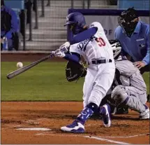  ?? Mark J. Terrill Associated Press ?? MOOKIE BETTS CONNECTED for his second home run of the season in the third inning against the Rockies.