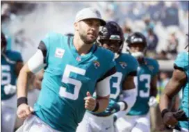  ?? STEPHEN B. MORTON— THE ASSOCIATED PRESS FILE ?? The Jaguars are sticking with Blake Bortles at quarterbac­k, but his hold on the job is tenuous.