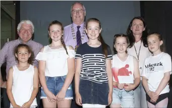  ??  ?? 5TH AND 6TH CLASS WINNERS: Becky Cashin (Highly Commended), St Fintan’s NS, Taghmon, and Emma Murphy (1st Prize), Leanne Mahon (Highly Commended), Ailbhe Fortune (Joint 2nd), and Zara Keating (Joint 3rd) all Our Lady of Lourdes NS, Bunclody, with...