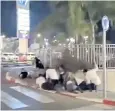  ?? ?? Civilians take shelter as sirens ring out across Israeli cities during the attack