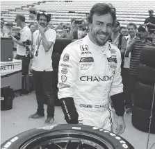  ?? MICHAEL CONROY/THE ASSOCIATED PRESS ?? Former Formula One champ Fernando Alonso will be on the grid in Sunday’s Indianapol­is 500 IndyCar race in a bid to have an F1 world championsh­ip, Indy win and NASCAR crown.