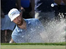  ?? LYNNE SLADKY — THE ASSOCIATED PRESS ?? Chris Kirk hits from a bunker onto the third green during the final round of the Honda Classic on Sunday in Palm Beach Gardens, Fla.