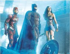  ??  ?? Ezra Miller, from left, Ben Affleck and Gal Gadot in Justice League. Justice League opens Friday, Nov. 17.