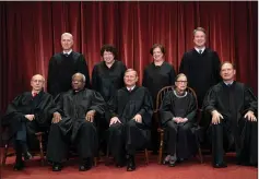  ?? Associated Press ?? ■ In this Nov. 30, 2018, file photo, the justices of the U.S. Supreme Court gather for a formal group portrait at the Supreme Court Building in Washington. Seated from left: Associate Justice Stephen Breyer, Associate Justice Clarence Thomas, Chief Justice of the United States John G. Roberts, Associate Justice Ruth Bader Ginsburg and Associate Justice Samuel Alito Jr. Standing behind from left: Associate Justice Neil Gorsuch, Associate Justice Sonia Sotomayor, Associate Justice Elena Kagan and Associate Justice Brett M. Kavanaugh.
