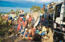  ?? DOCTORS WITHOUT BORDERS ?? People displaced by the conflict in Cabo Delgado, Mozambique, wait Thursday to be transporte­d to Palma, a coastal town attacked earlier this year.