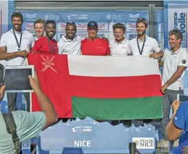  ??  ?? The Oman Sail Diam 24 Team members celebrate their fifth-place finish in Nice, France, on Saturday