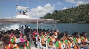  ?? TATIANA FERNANDEZ/THE ASSOCIATED PRESS/FILES ?? Passengers, many of them hearing impaired, head out on a whale watching tour equipped with high-tech backpacks that turn whale songs into vibrations.