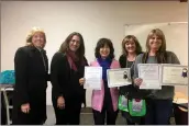  ??  ?? From left to right, Superinten­dent Catherine Kawaguchi, California Credit Union Community Developmen­t Coordinato­r Mariam Nasiry, Teacher Olivia Pateno, Principal Roni Andrus and Office Staff member Lisa McNerney at Mint Canyon Community School on...