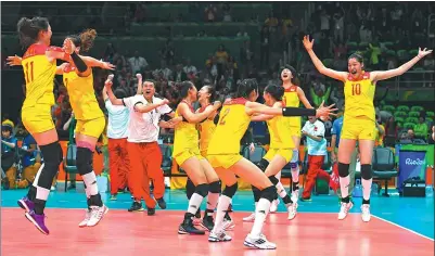  ??  ?? Above: Chinese players and coaches celebrate beating Serbia to win gold at last year’s Rio Olympic Games. Indebted to wide-ranging reform of the sport over the past five years, the women’s national team, which also won the Grand Champions Cup last...