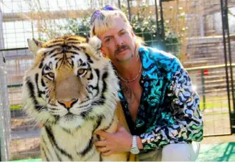  ?? Netflix via Getty Images ?? While in jail, Joe Exotic — aka Joseph Schreibvog­el — has become a miniseries sensation via the Netflix documentar­y “Tiger King.”