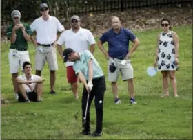  ?? CHUCK BURTON — THE ASSOCIATED PRESS ?? Webb Simpson hits from the rough to the ninth hole during the second round of the Wyndham Championsh­ip golf tournament in Greensboro, N.C., Friday.