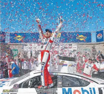  ?? SARAH CRABILL/GETTY IMAGES ?? Kevin Harvick celebrates in Victory Lane after winning Sunday’s Toyota/Save Mart 350 — his first victory of the Monster Energy Cup season — at Sonoma Raceway. It also was Harvick’s first Cup win at the California road course.