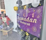  ?? ?? Westminste­r city council’s Ramadan display, above, and hastily arranged Easter array, right