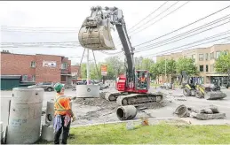  ?? JOHN MAHONEY ?? Constructi­on on Cartier Ave. near Salisbury Ave. resumed Tuesday morning in Pointe-Claire.