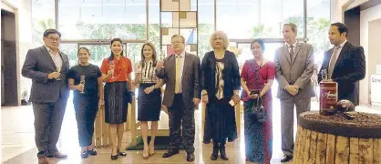  ??  ?? Tourism Secretary Bernadette Romulo-Puyat (fourth from left) with SSI president Anton Huang (far left) and special guests at the food trade fair.